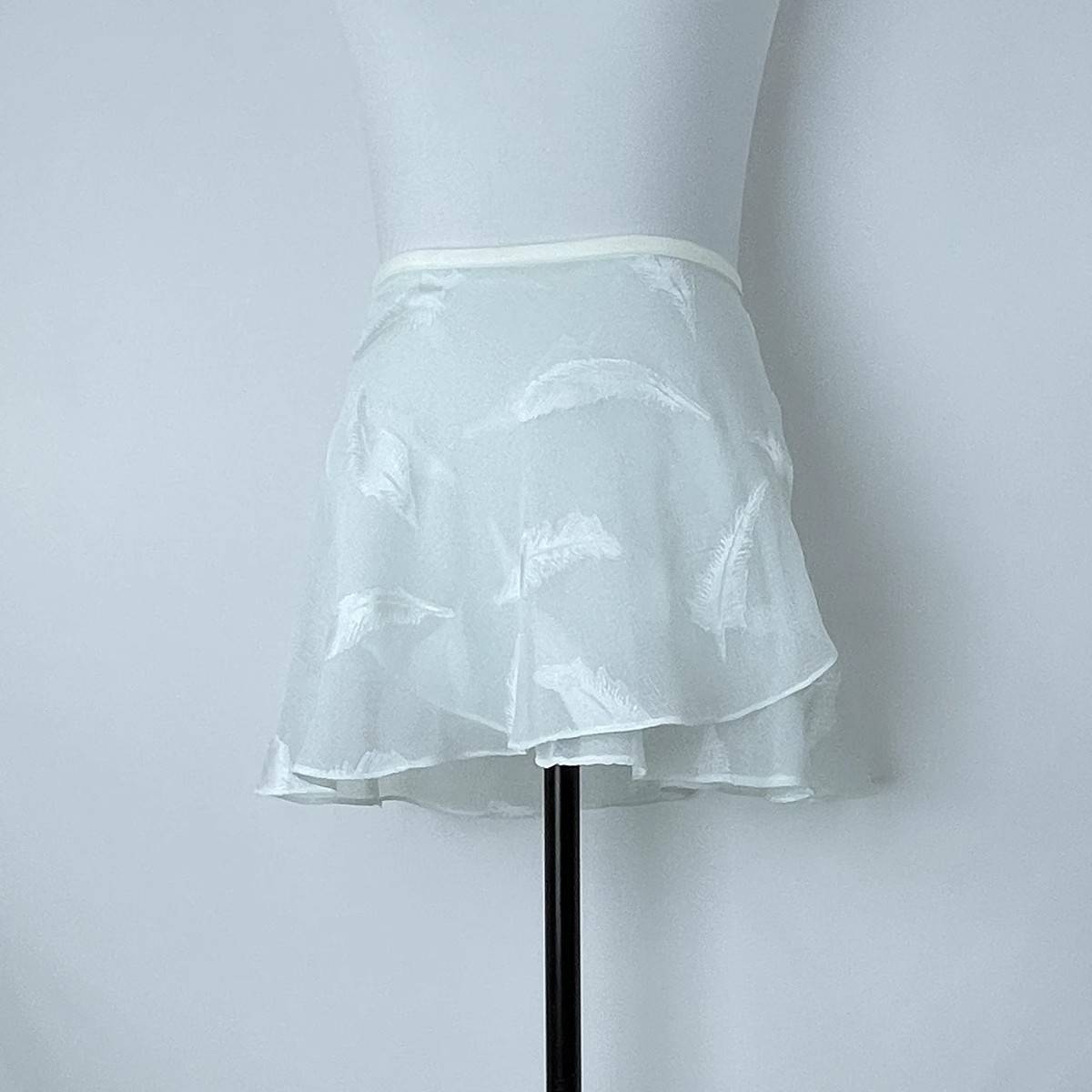 A green feather skirt
